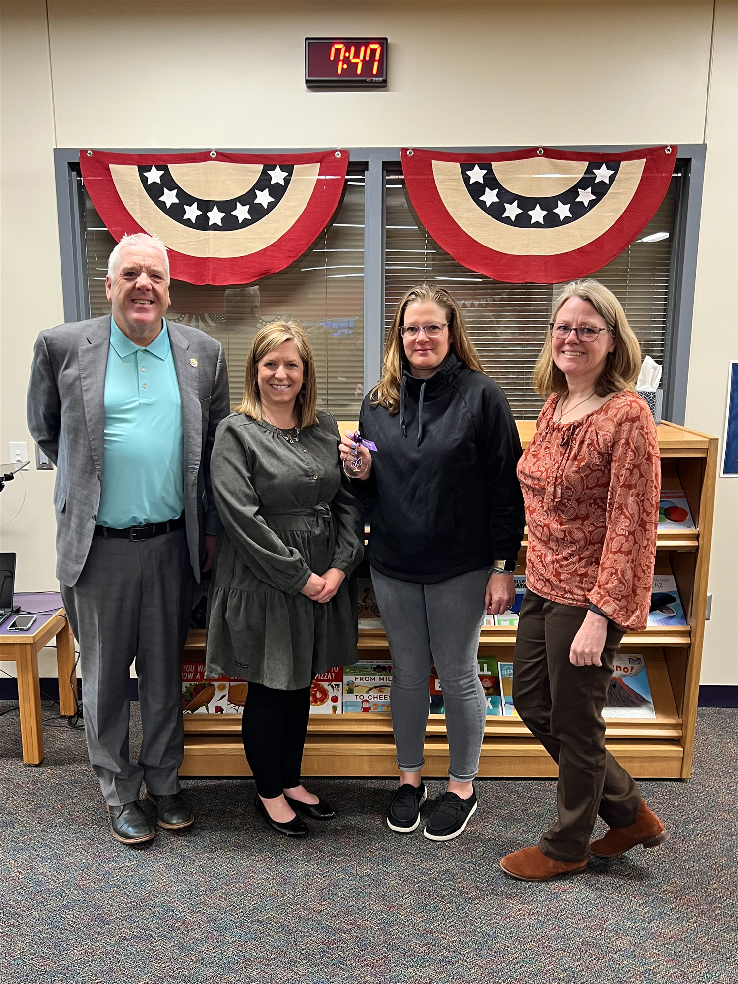 Jamie Gabel, with leadership, smiling with Core Values Award