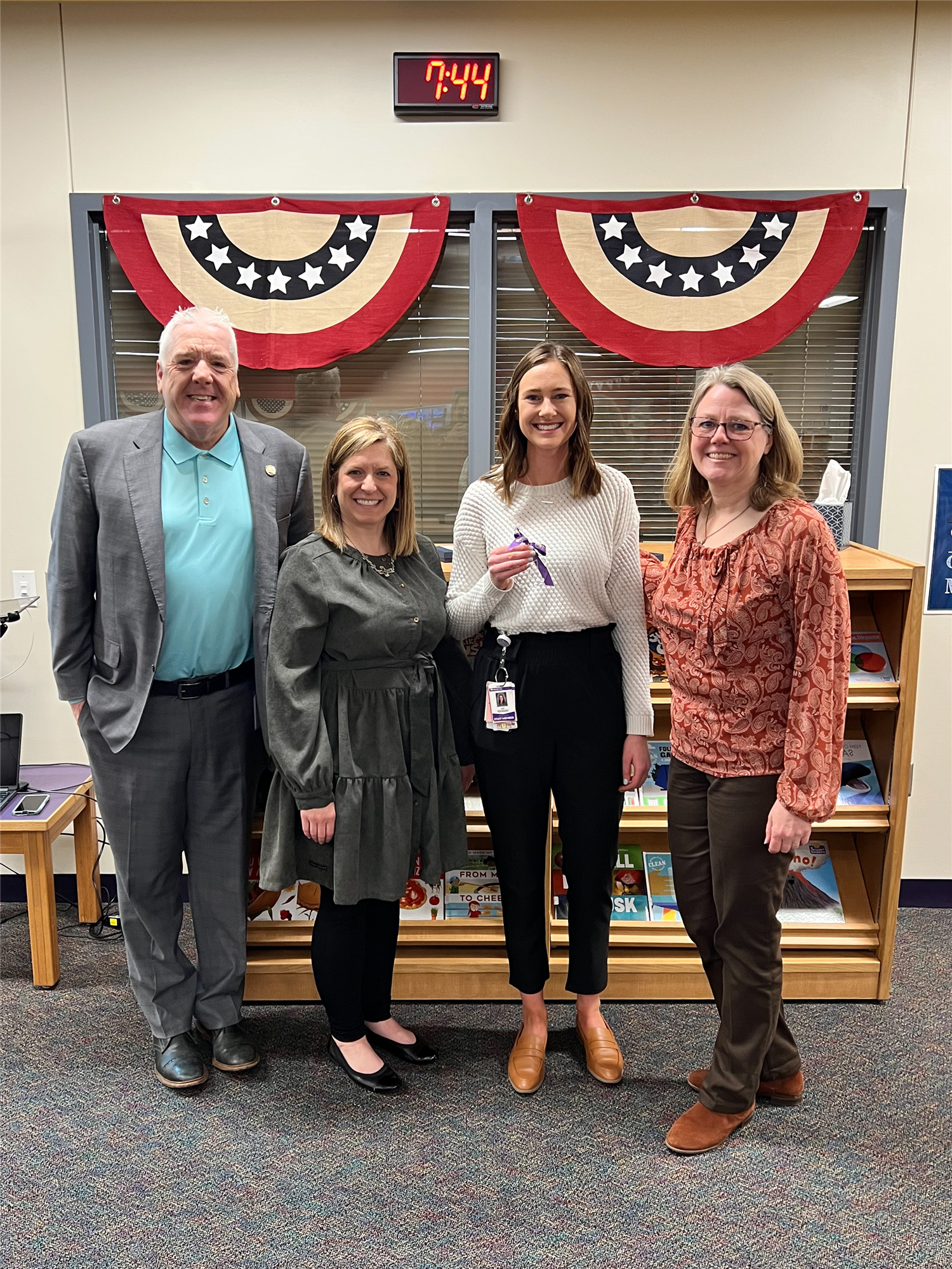 Laura Rickabaugh, with leadership, smiling with Core Values Award