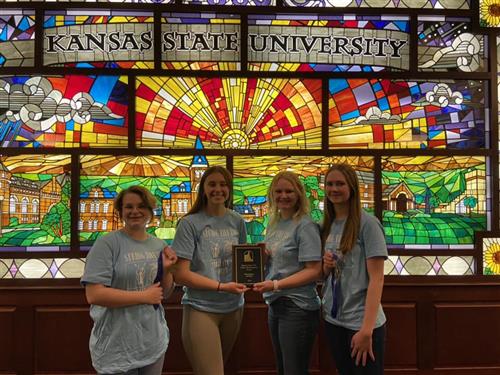 Elli Winbolt, Hannah King, Peyton Sherron,  and Brooklyn Sherron with their 1st place plaque at KSU.