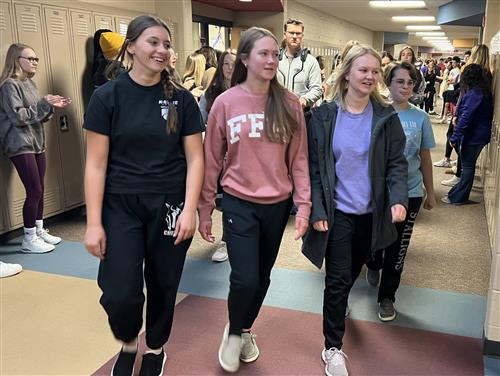 Hannah King, Brooklyn Sherron, Petyson Sherron, and Elli Winboldt during their drum line parade.