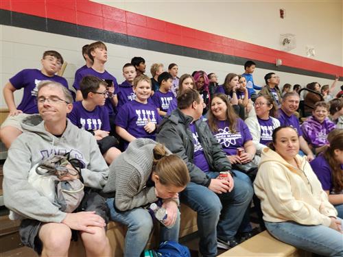 WSMS Science Olympiad team members and supporters await the results of the competition.