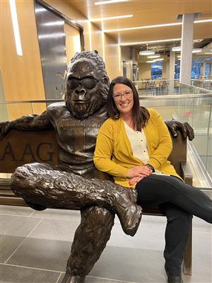 Gazzano poses with Pitt State Gorilla statue