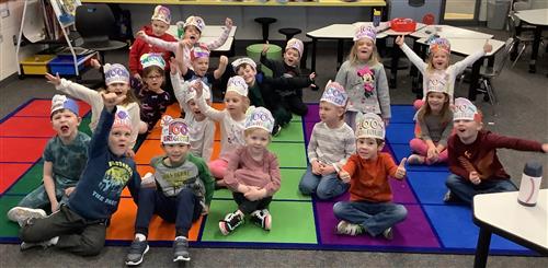 students showing excitement for being 100 days brighter