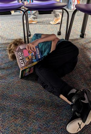 Student reading a book