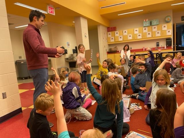  Brian Sturm talking to the PCES 1st grade about their ideas for the new playground project