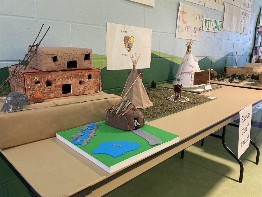  A Native American village with 2 teepee's