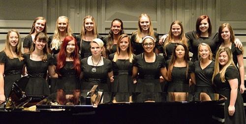 SHHS students in the Destiny choir smiling in a group