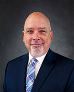 Headshot of Joshua Robinson